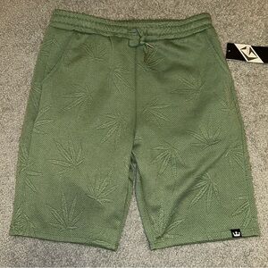 Stylish Green Athletic Shorts with Leaf Pattern